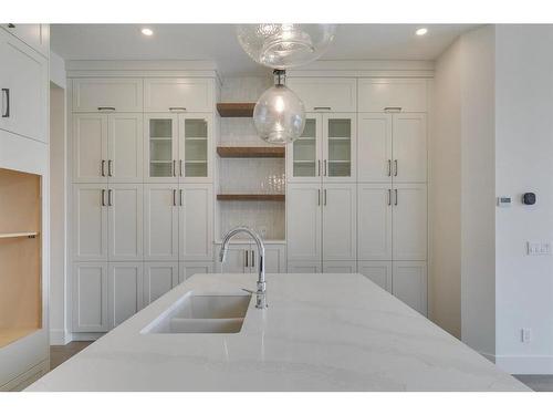 71 Royal Birch Cove Nw, Calgary, AB - Indoor Photo Showing Kitchen With Double Sink