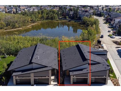 71 Royal Birch Cove Nw, Calgary, AB - Outdoor With Body Of Water With View