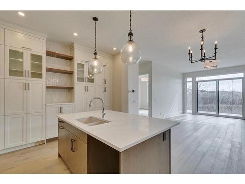 71 Royal Birch Cove Nw, Calgary, AB - Indoor Photo Showing Kitchen With Double Sink With Upgraded Kitchen