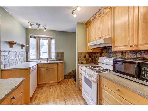 1921 23 Avenue Nw, Calgary, AB - Indoor Photo Showing Kitchen With Double Sink