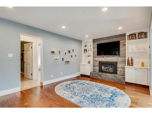 151 Midvalley Place Se, Calgary, AB - Indoor Photo Showing Living Room With Fireplace