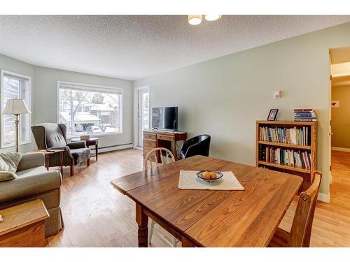 206-1206 Hawksbrow Point Nw, Calgary, AB - Indoor Photo Showing Living Room