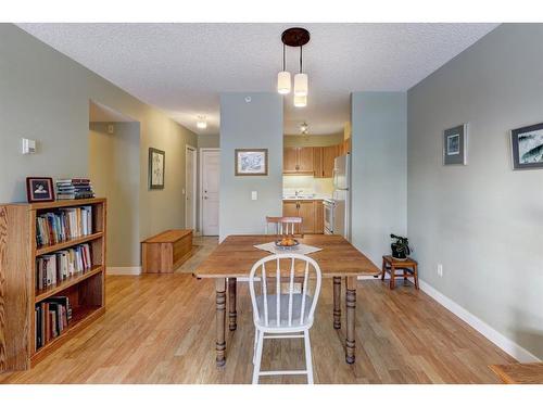 206-1206 Hawksbrow Point Nw, Calgary, AB - Indoor Photo Showing Dining Room