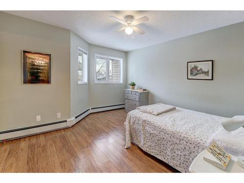 206-1206 Hawksbrow Point Nw, Calgary, AB - Indoor Photo Showing Bedroom