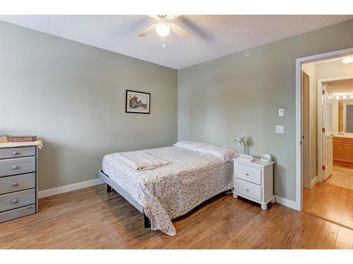 206-1206 Hawksbrow Point Nw, Calgary, AB - Indoor Photo Showing Bedroom