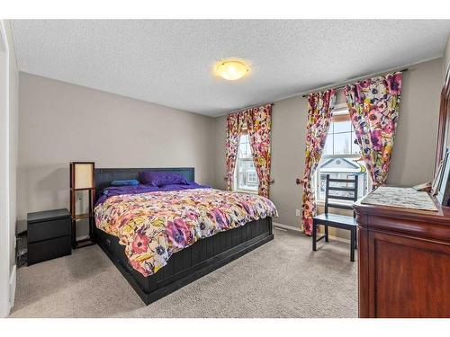 195 Cranberry Close Se, Calgary, AB - Indoor Photo Showing Bedroom