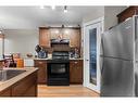 195 Cranberry Close Se, Calgary, AB  - Indoor Photo Showing Kitchen 