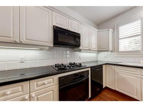 117 Evergreen Way Sw, Calgary, AB - Indoor Photo Showing Kitchen With Upgraded Kitchen