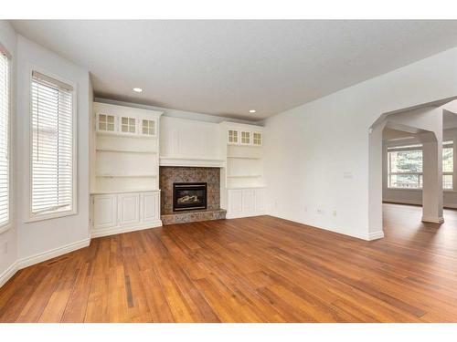 117 Evergreen Way Sw, Calgary, AB - Indoor Photo Showing Living Room With Fireplace