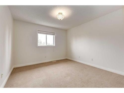 117 Evergreen Way Sw, Calgary, AB - Indoor Photo Showing Other Room