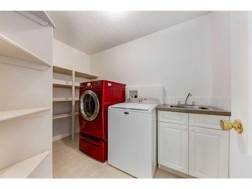 117 Evergreen Way Sw, Calgary, AB - Indoor Photo Showing Laundry Room