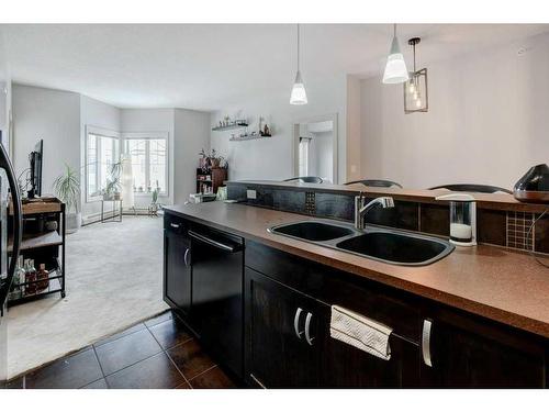 409-30 Royal Oak Plaza Nw, Calgary, AB - Indoor Photo Showing Kitchen With Double Sink