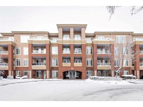 205-2 Hemlock Crescent Sw, Calgary, AB - Outdoor With Facade