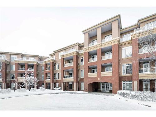 205-2 Hemlock Crescent Sw, Calgary, AB - Outdoor With Facade