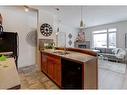 205-2 Hemlock Crescent Sw, Calgary, AB  - Indoor With Fireplace 