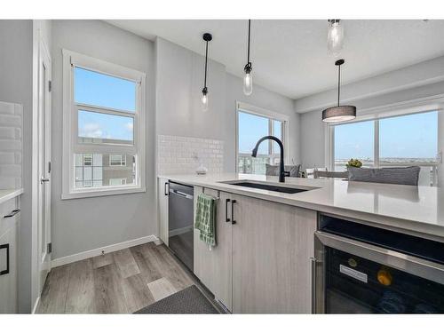 416-80 Carrington Plaza Nw, Calgary, AB - Indoor Photo Showing Kitchen With Upgraded Kitchen