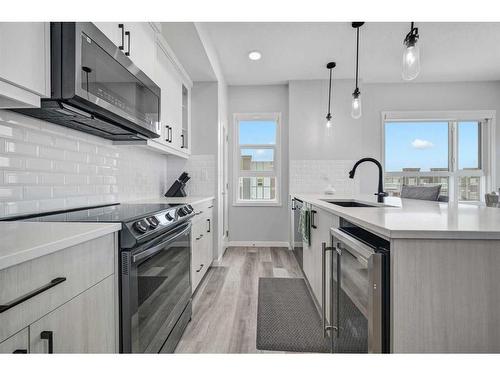 416-80 Carrington Plaza Nw, Calgary, AB - Indoor Photo Showing Kitchen With Stainless Steel Kitchen With Upgraded Kitchen