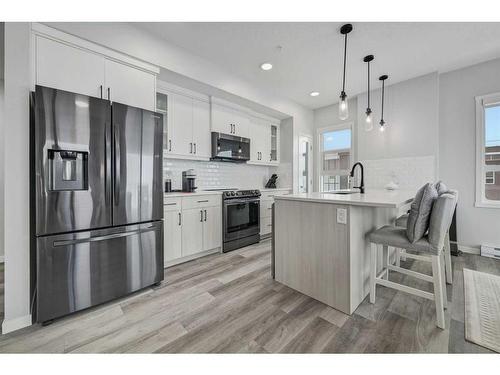 416-80 Carrington Plaza Nw, Calgary, AB - Indoor Photo Showing Kitchen With Stainless Steel Kitchen With Upgraded Kitchen