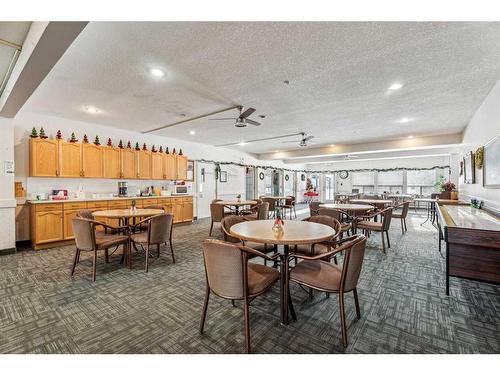 201-3 Parklane Way, Strathmore, AB - Indoor Photo Showing Dining Room