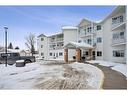 201-3 Parklane Way, Strathmore, AB  - Outdoor With Balcony With Facade 