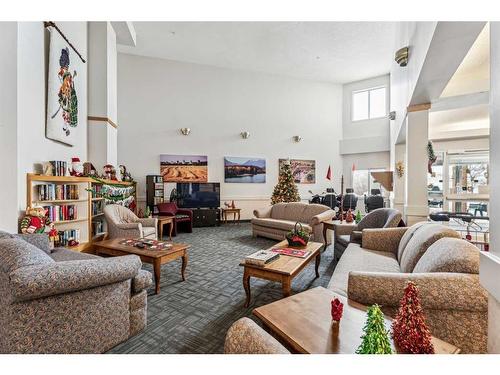 201-3 Parklane Way, Strathmore, AB - Indoor Photo Showing Living Room