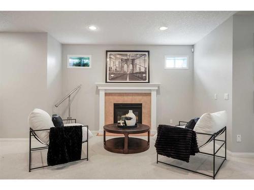 47 Hamptons Close Nw, Calgary, AB - Indoor With Fireplace