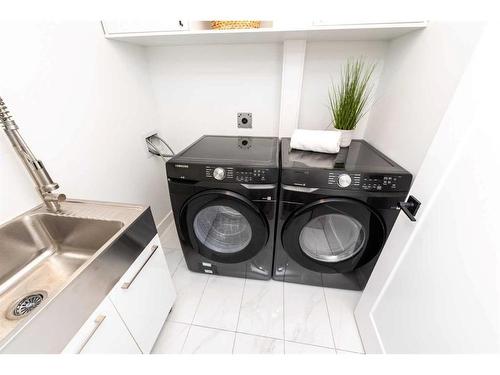 908 87 Avenue Sw, Calgary, AB - Indoor Photo Showing Laundry Room