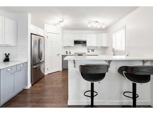 40 Moe Avenue Nw, Langdon, AB - Indoor Photo Showing Kitchen With Stainless Steel Kitchen