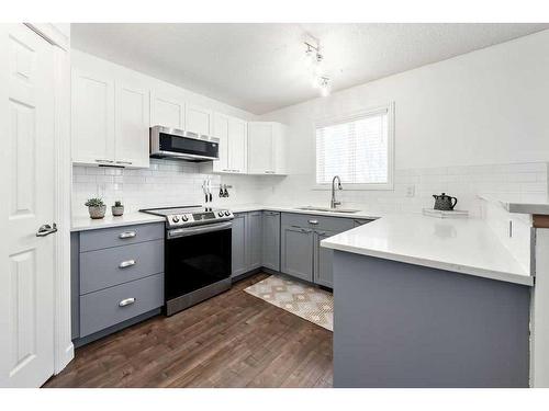 40 Moe Avenue Nw, Langdon, AB - Indoor Photo Showing Kitchen With Upgraded Kitchen