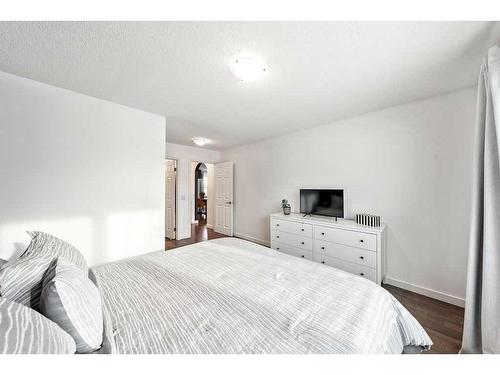 40 Moe Avenue Nw, Langdon, AB - Indoor Photo Showing Bedroom