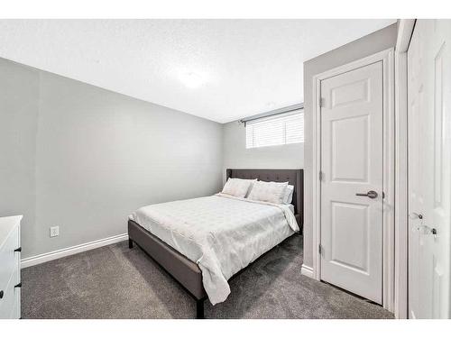 40 Moe Avenue Nw, Langdon, AB - Indoor Photo Showing Bedroom