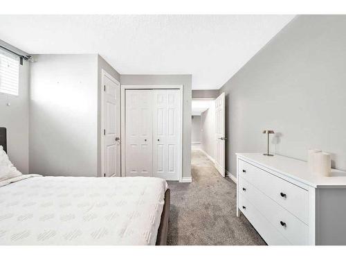 40 Moe Avenue Nw, Langdon, AB - Indoor Photo Showing Bedroom