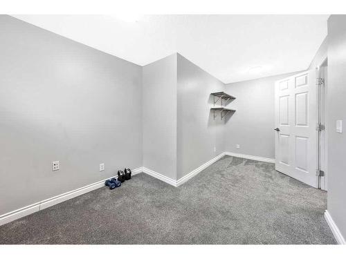 40 Moe Avenue Nw, Langdon, AB - Indoor Photo Showing Other Room