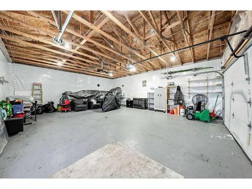 40 Moe Avenue Nw, Langdon, AB - Indoor Photo Showing Garage