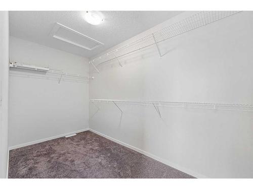 805 Windbury Street Sw, Airdrie, AB - Indoor With Storage