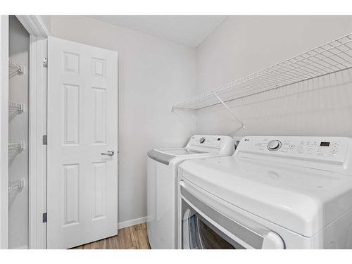 805 Windbury Street Sw, Airdrie, AB - Indoor Photo Showing Laundry Room