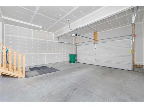 805 Windbury Street Sw, Airdrie, AB - Indoor Photo Showing Garage