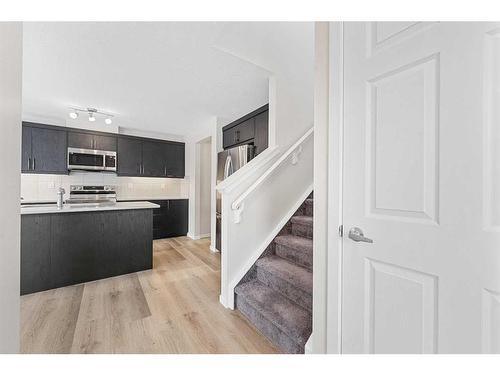 805 Windbury Street Sw, Airdrie, AB - Indoor Photo Showing Kitchen