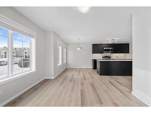 805 Windbury Street Sw, Airdrie, AB - Indoor Photo Showing Kitchen