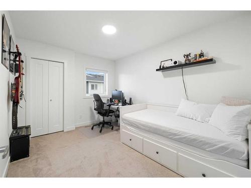 117 Walden Lane Se, Calgary, AB - Indoor Photo Showing Bedroom