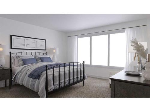 349 Baneberry Way Sw, Airdrie, AB - Indoor Photo Showing Bedroom