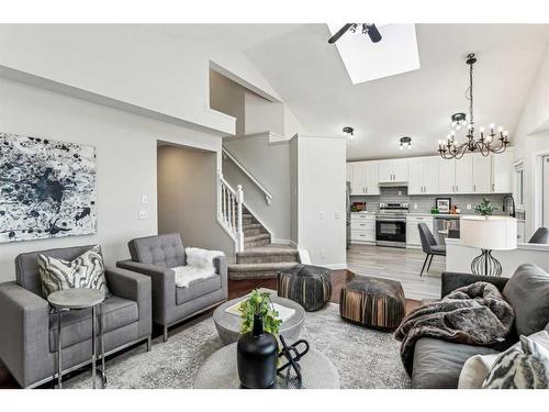 751 Mckenzie Lake Bay Se, Calgary, AB - Indoor Photo Showing Living Room