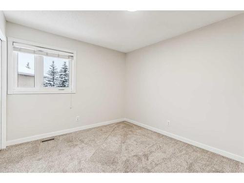 751 Mckenzie Lake Bay Se, Calgary, AB - Indoor Photo Showing Other Room