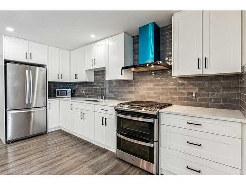 751 Mckenzie Lake Bay Se, Calgary, AB - Indoor Photo Showing Kitchen With Upgraded Kitchen