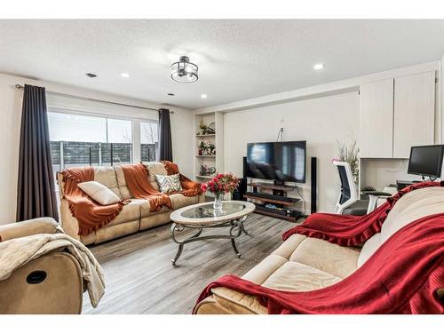 751 Mckenzie Lake Bay Se, Calgary, AB - Indoor Photo Showing Living Room