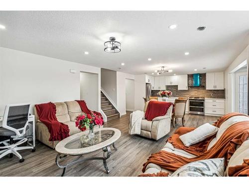 751 Mckenzie Lake Bay Se, Calgary, AB - Indoor Photo Showing Living Room