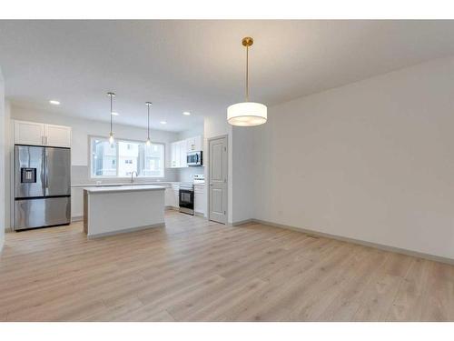 513 Bayview Street Sw, Airdrie, AB - Indoor Photo Showing Kitchen