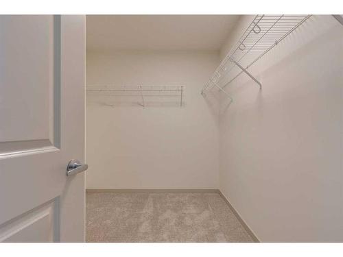 513 Bayview Street Sw, Airdrie, AB - Indoor With Storage