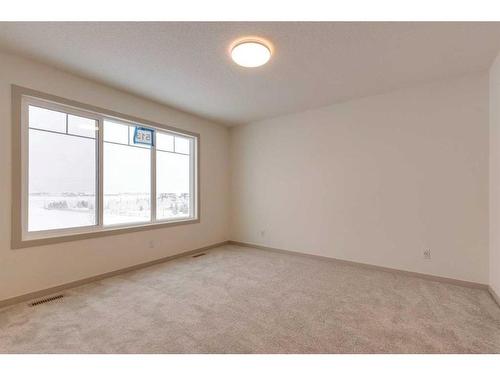 513 Bayview Street Sw, Airdrie, AB - Indoor Photo Showing Other Room