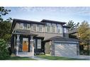 171 Mill Road, Cochrane, AB  - Outdoor With Facade 